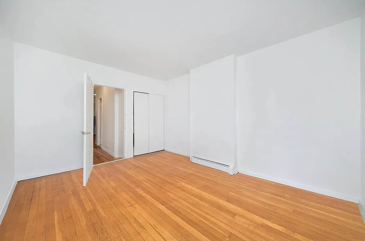 103 West 105th Street, Unit 2A Manhattan, NY 10025 - Photo 8 of 10 a view of empty room with wooden floor
