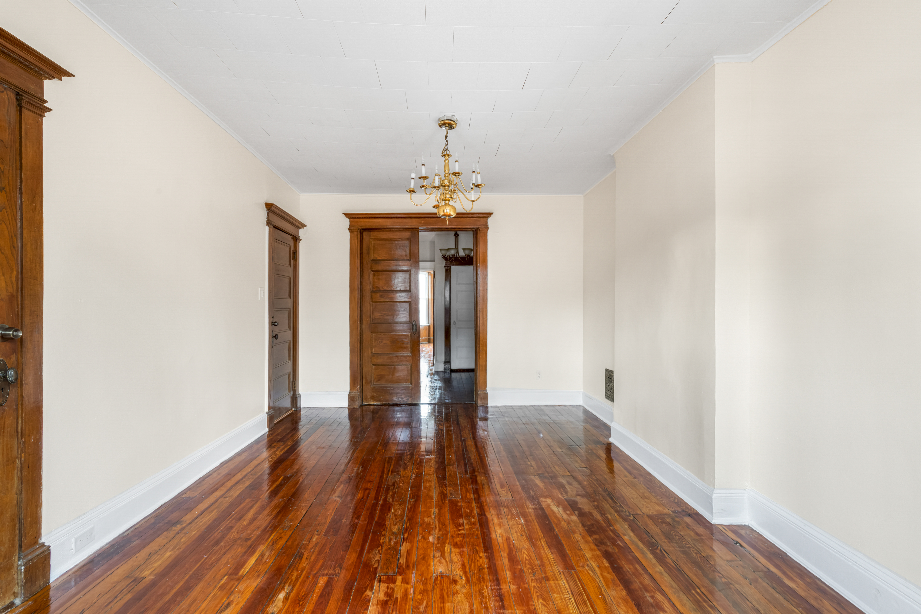 601 Jefferson Avenue, Unit 2 Brooklyn, NY 11221 - Photo 2 of 8 a very nice looking room with wooden floor and ceiling fan
