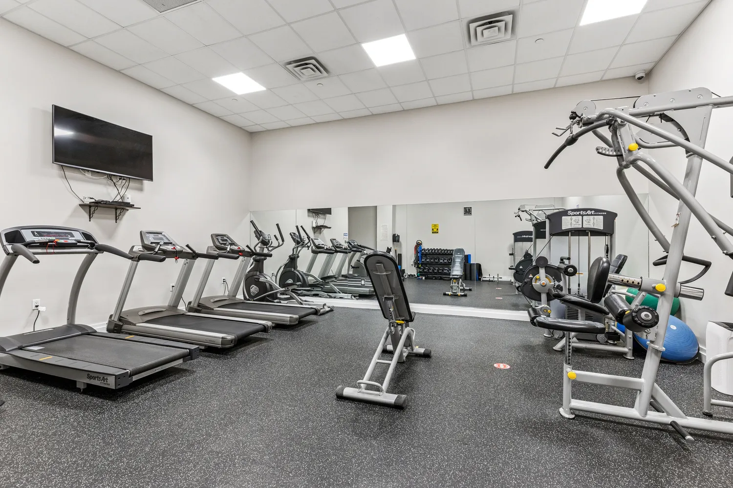 a view of a room with gym equipment