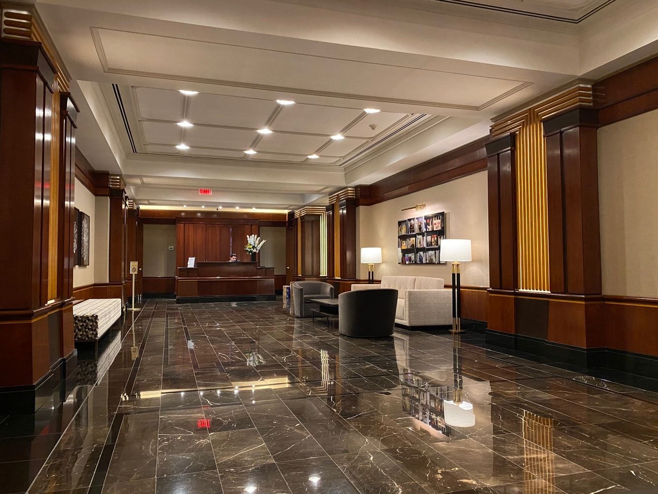 160 West 66th Street, Unit 23D Manhattan, NY 10023 - Photo 8 of 10 a lobby with furniture and a potted plant