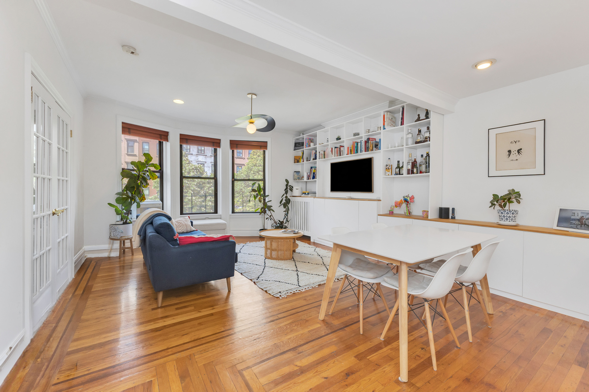 74 2nd Place, Unit 2B Brooklyn, NY 11231 - Photo 5 of 14 a living room with fireplace furniture and a flat screen tv