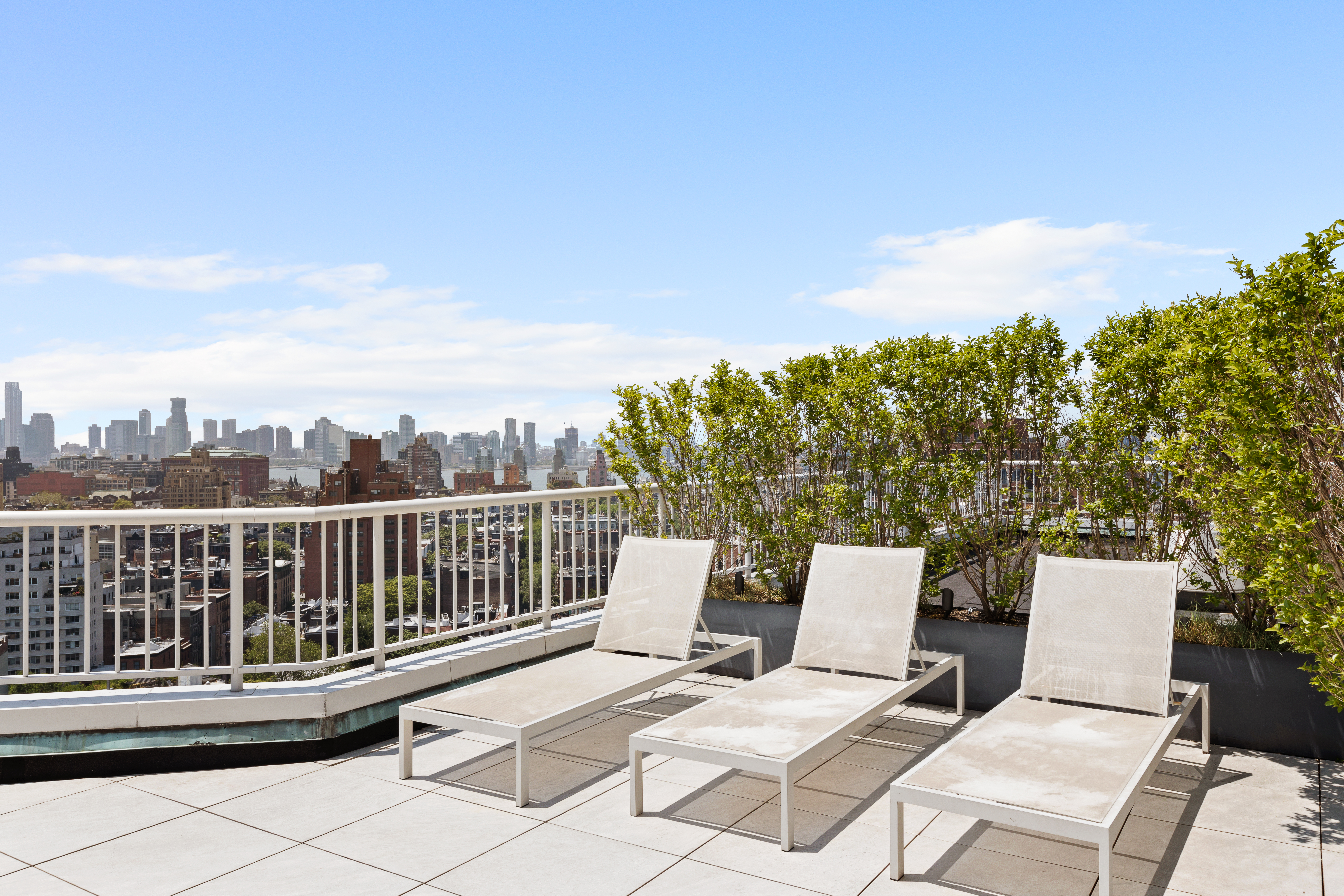 101 West 12th Street, Unit 9D Manhattan, NY 10011 - Photo 7 of 8 a view of a chair and tables