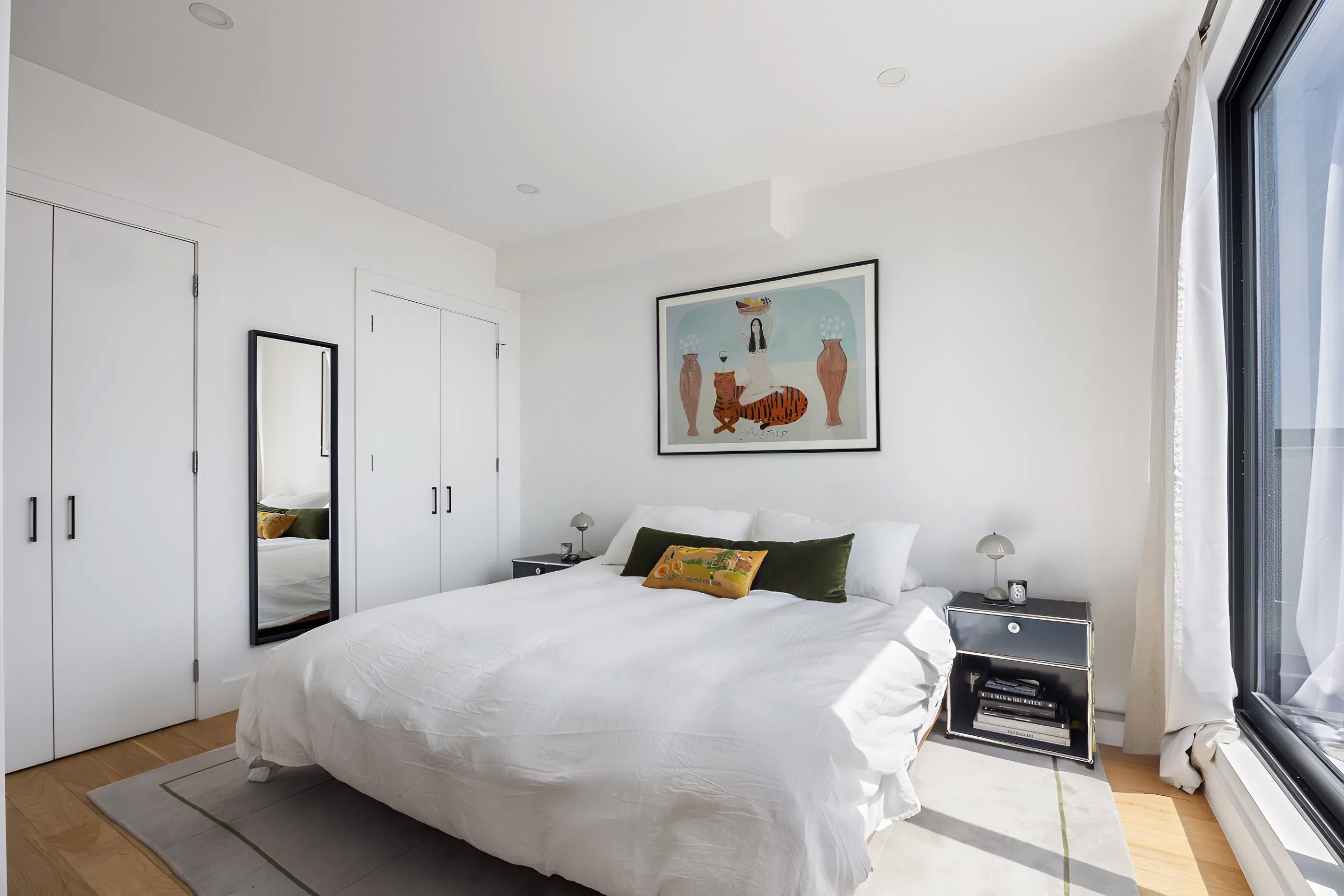 340 Metropolitan Avenue, Unit PHB Brooklyn, NY 11211 - Photo 8 of 18 a bedroom with a bed and wooden floor