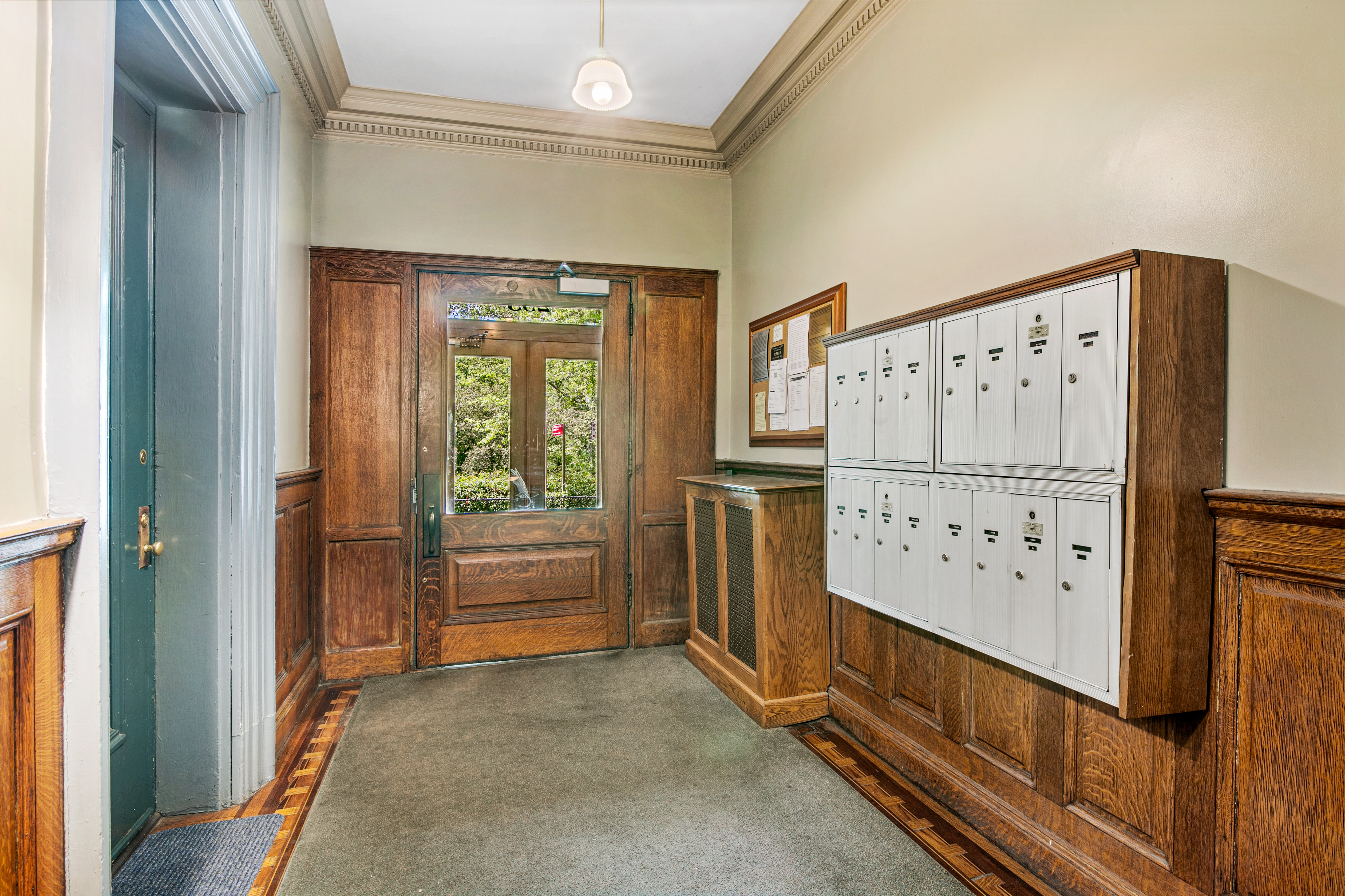 293 Riverside Drive, Unit 5B Manhattan, NY 10025 - Photo 8 of 9 a view of a hallway with staircase