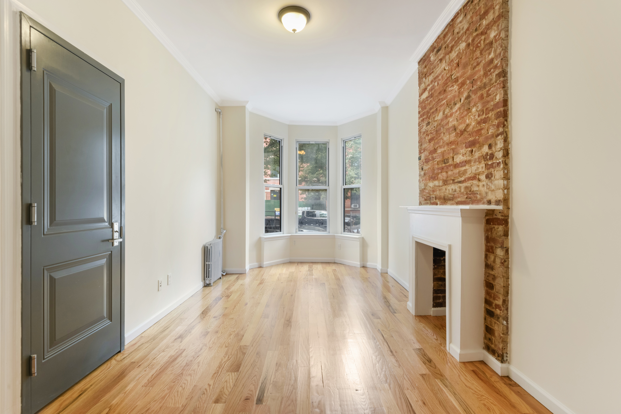 262 12th Street, Unit 1L Brooklyn, NY 11215 - Photo 4 of 10 a view of livingroom with furniture and wooden floor