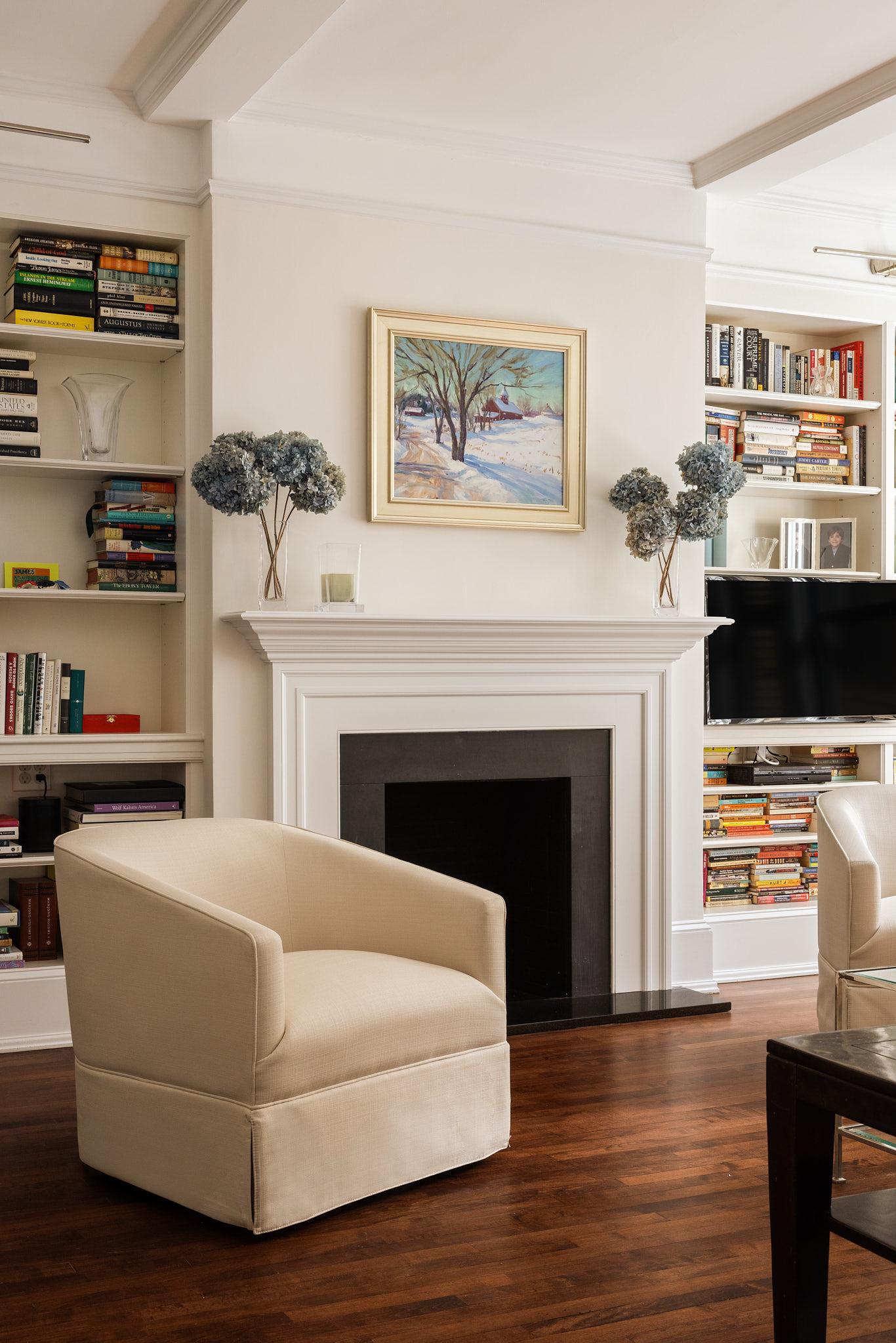 114 East 84th Street, Unit 3D Manhattan, NY 10028 - Photo 10 of 11 a living room with furniture and a fireplace
