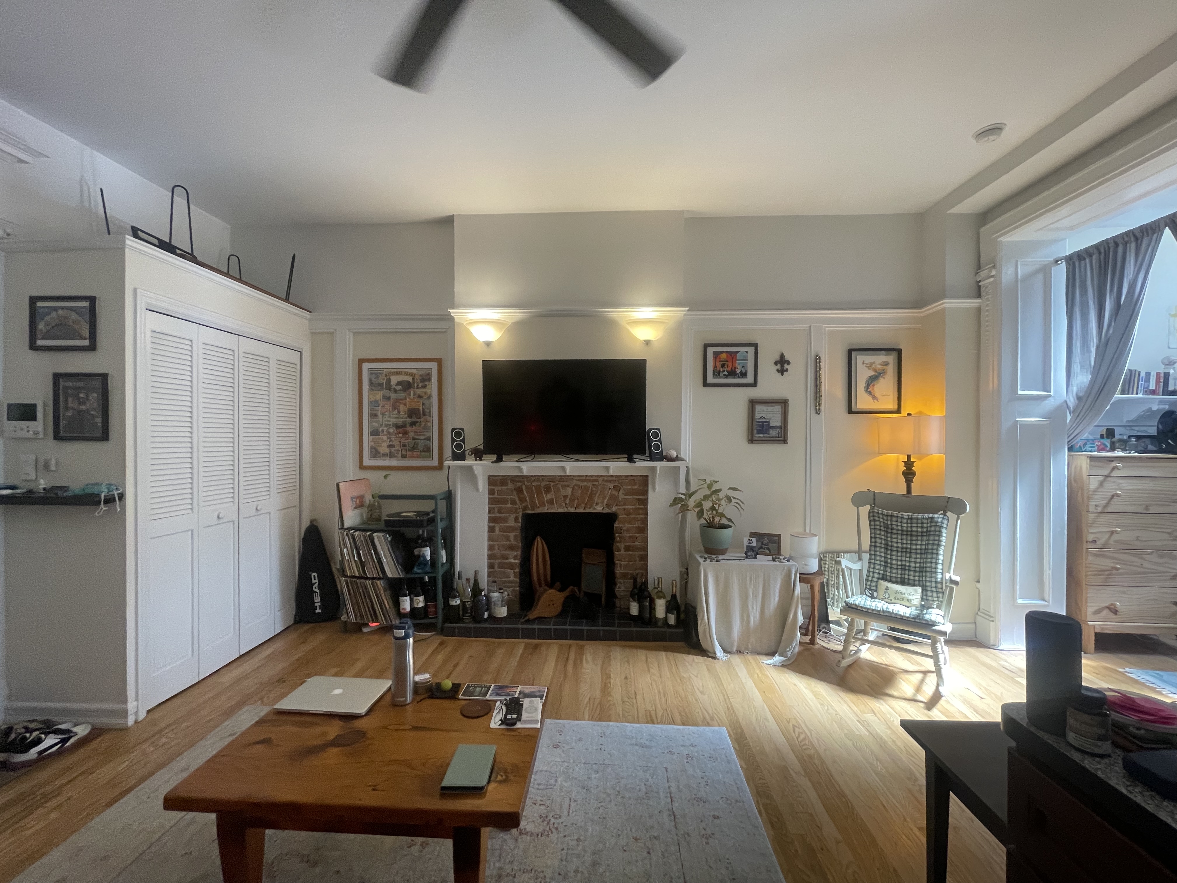 30 Montgomery Place, Unit 2 Brooklyn, NY 11215 - Photo 3 of 17 a living room with furniture a flat screen tv and a fireplace