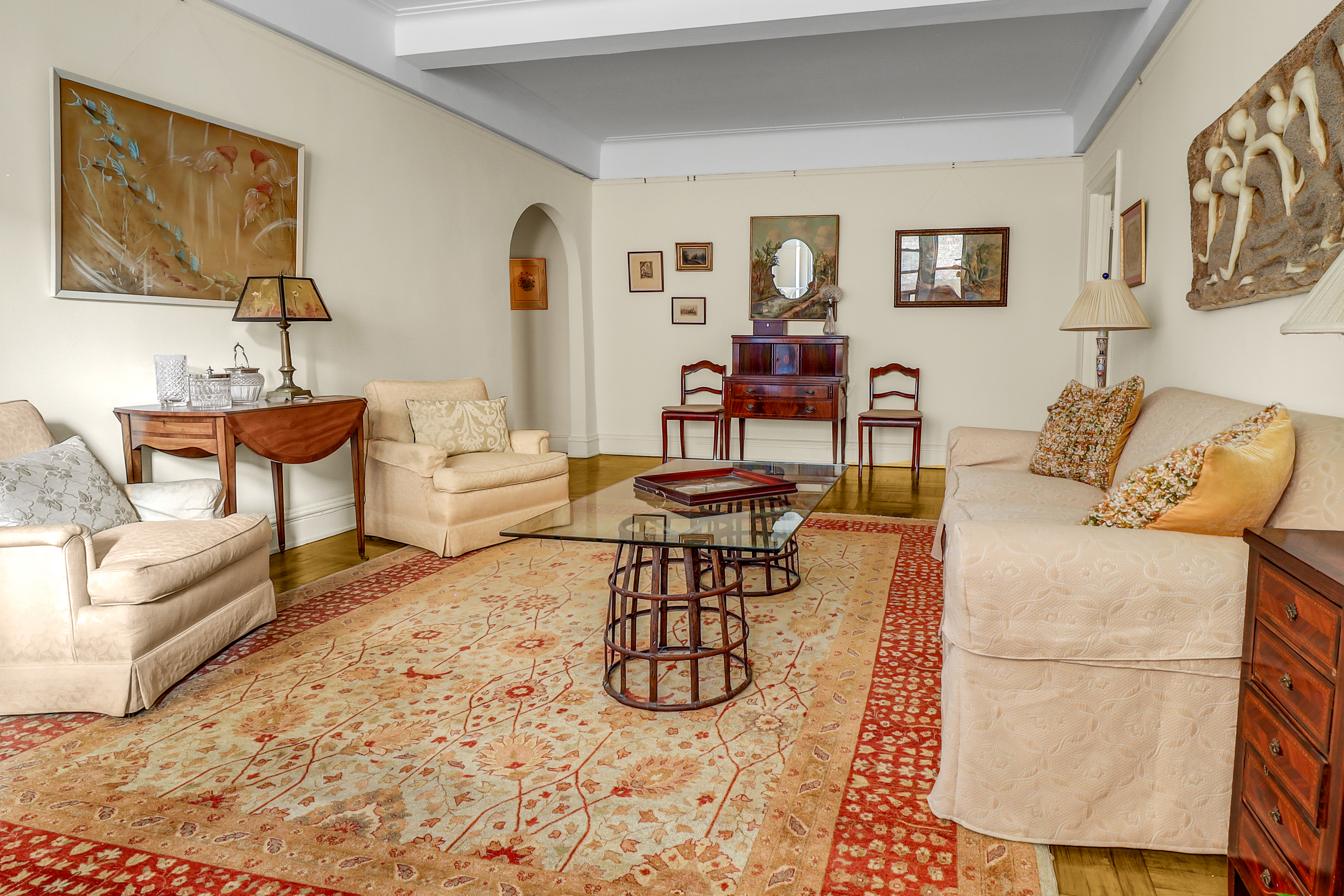 50 Riverside Drive, Unit 5E Manhattan, NY 10024 - Photo 4 of 22 a living room with furniture and wooden floor