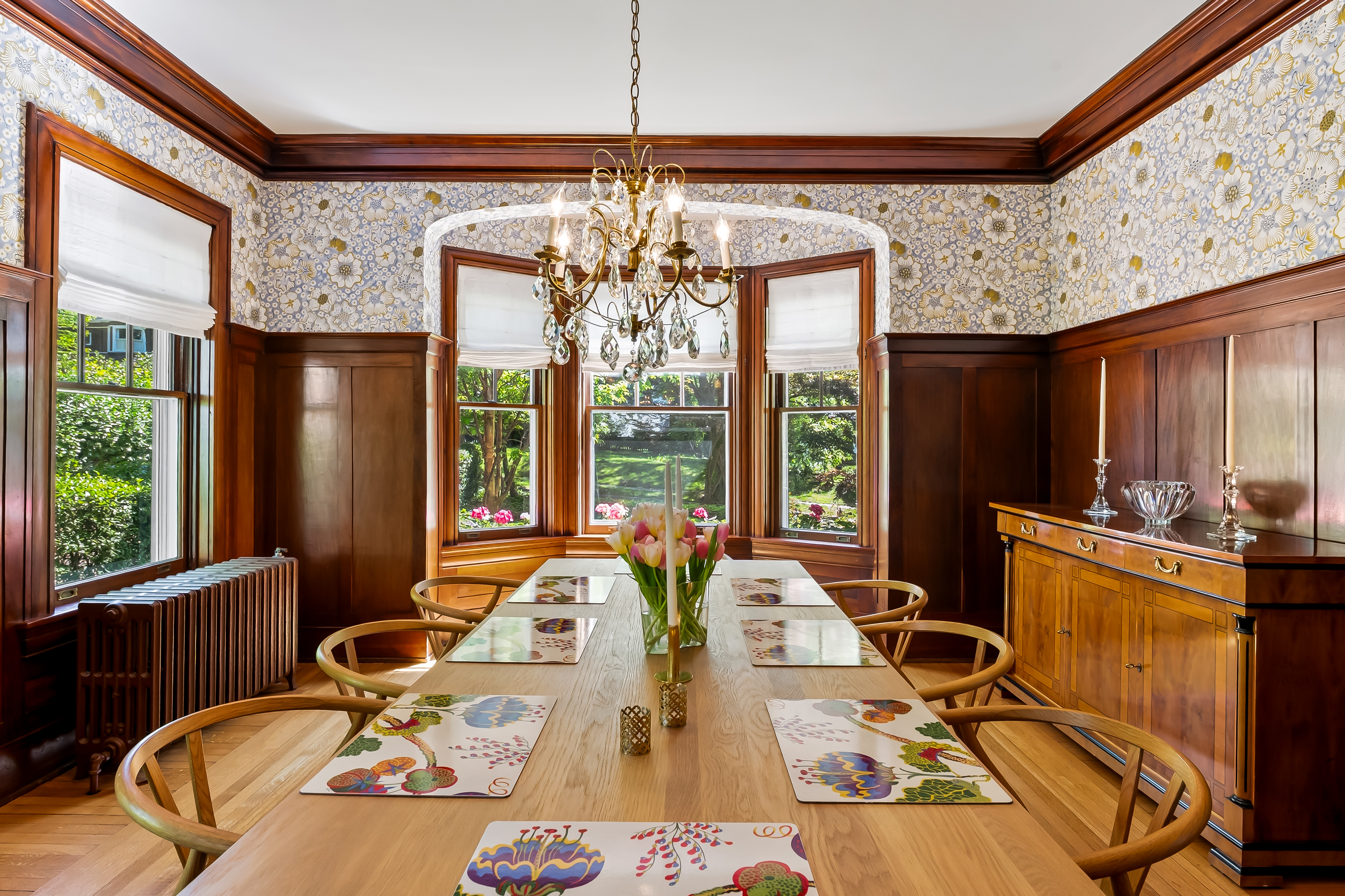 6 Elmhurst Road Baltimore, MD 21210 - Photo 32 of 100 a view of a dining room with furniture a chandelier and large windows