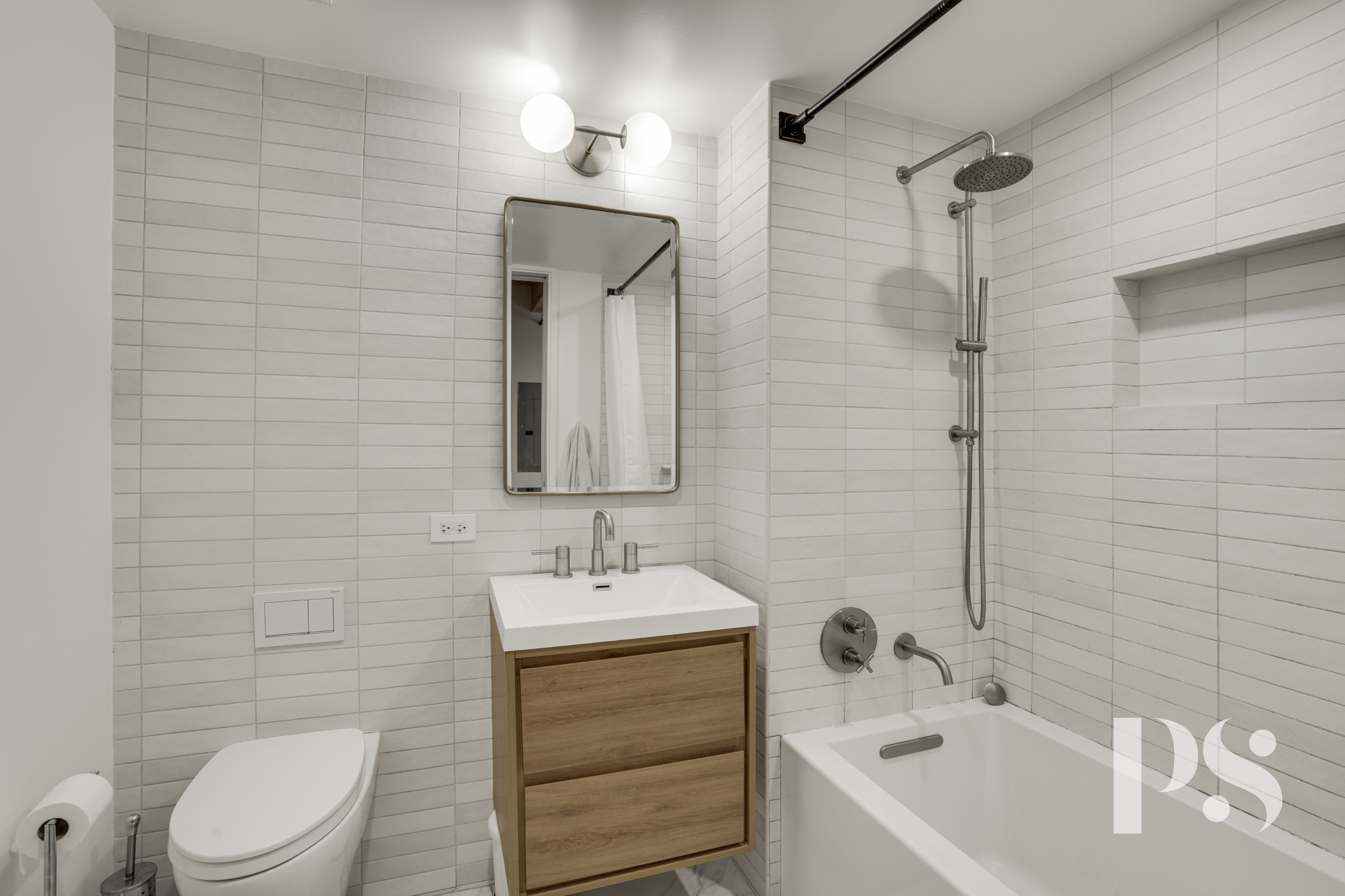 120 Java Street, Unit 1B Brooklyn, NY 11222 - Photo 4 of 12 a bathroom with a sink a toilet and shower