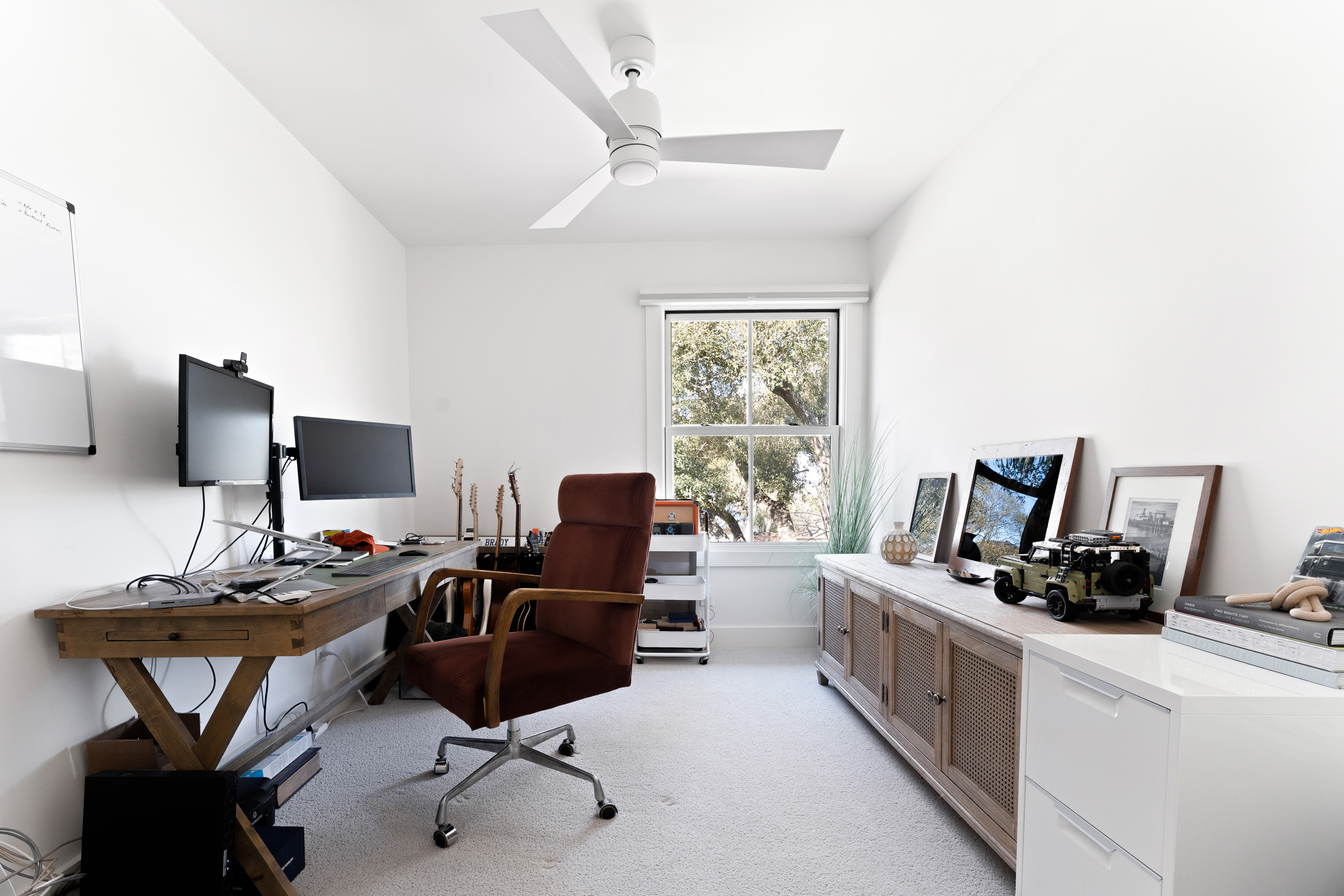 1317 Thaddeus Cove Austin, TX 78746 - Photo 17 of 22 a living room with furniture and a flat screen tv