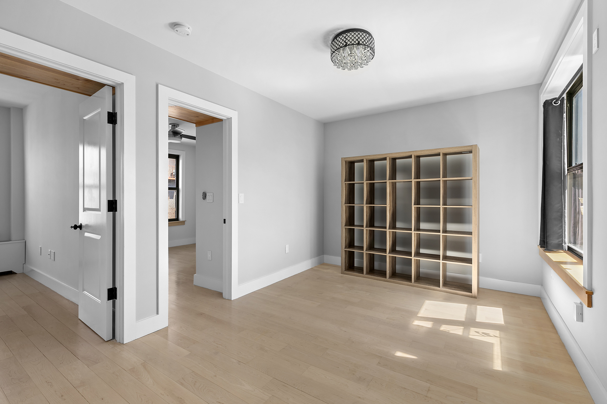 108 Division Avenue, Unit 22 Brooklyn, NY 11211 - Photo 6 of 11 an empty room with a empty space and windows