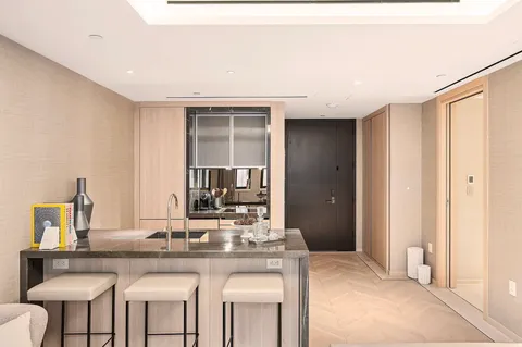 a kitchen with stainless steel appliances granite countertop a sink and cabinets