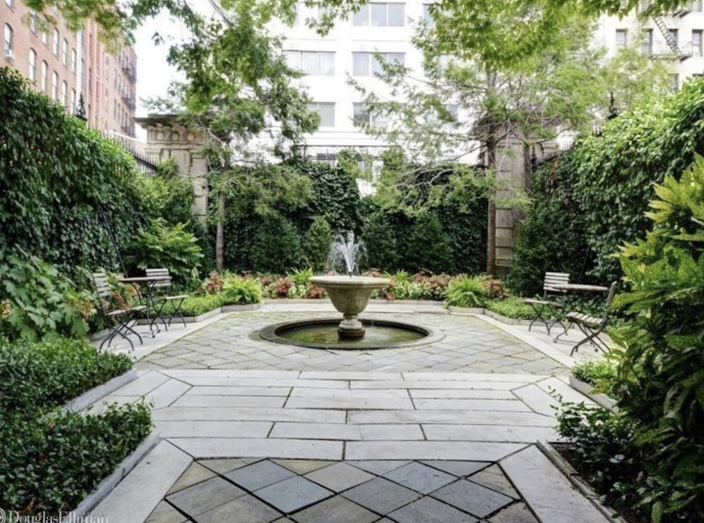 240 Centre Street, Unit 3B Manhattan, NY 10013 - Photo 18 of 23 a view of a fountain in the middle of a yard