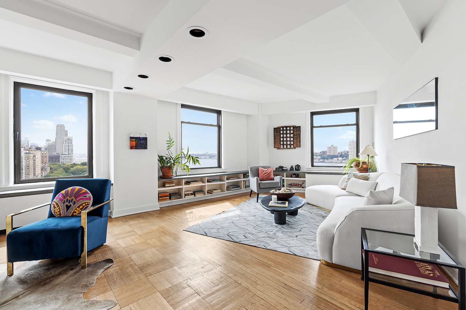 110-118 Riverside Drive, Unit 15A Manhattan, NY 10024 - Photo 2 of 17 a living room with furniture and a flat screen tv