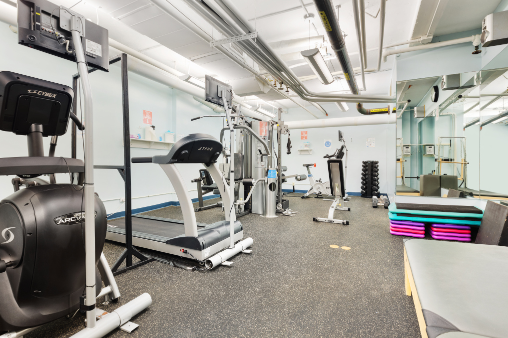 885 West End Avenue, Unit 12D Manhattan, NY 10025 - Photo 18 of 24 a room with gym equipment