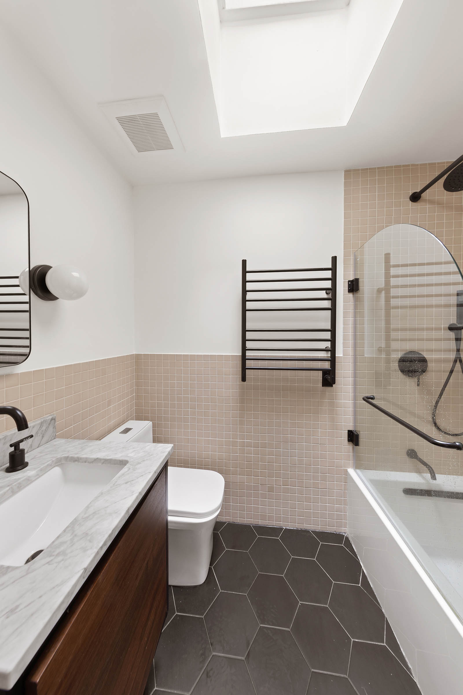 209 Onderdonk Avenue Queens, NY 11385 - Photo 6 of 16 a bathroom with a sink toilet and shower