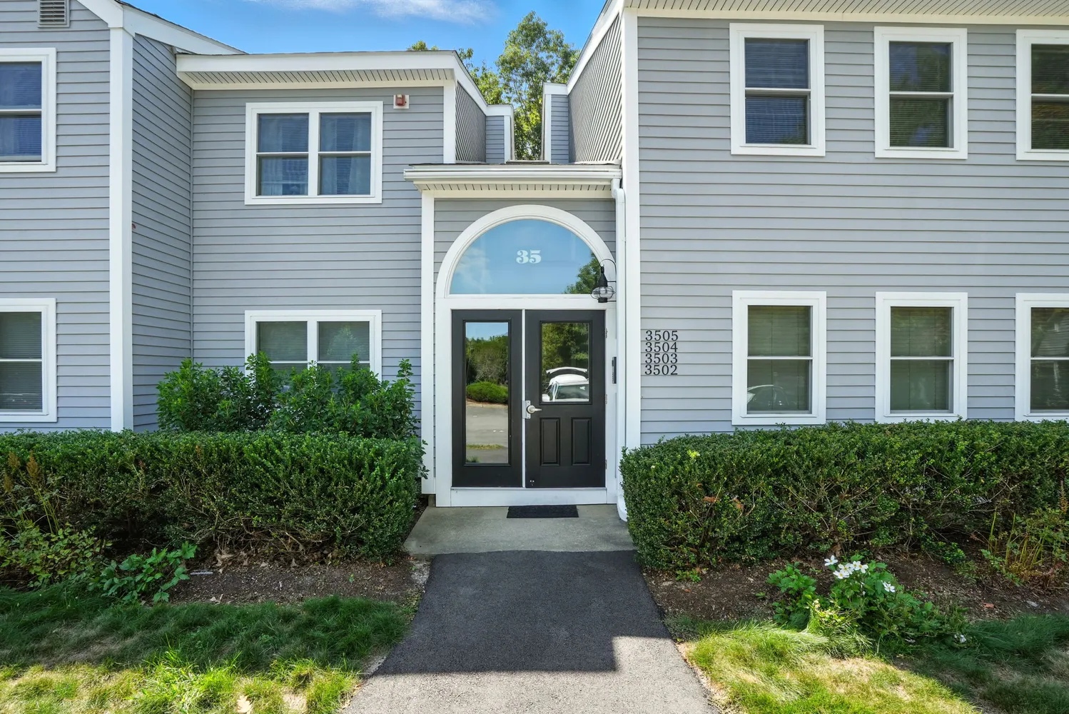 a front view of a house having yard