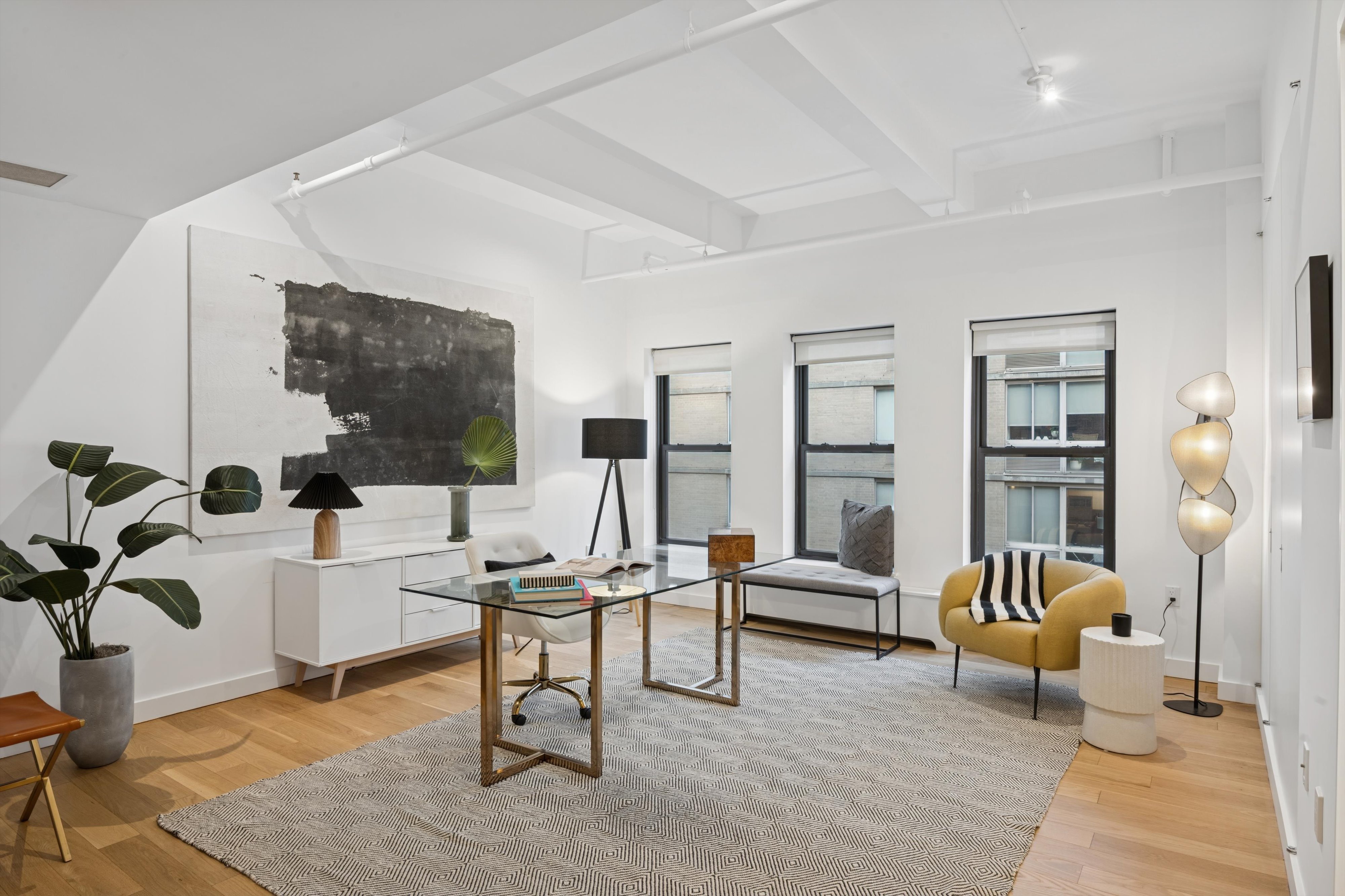 109 West 26th Street, Unit 9 Manhattan, NY 10001 - Photo 10 of 23 a living room with furniture and a flat screen tv