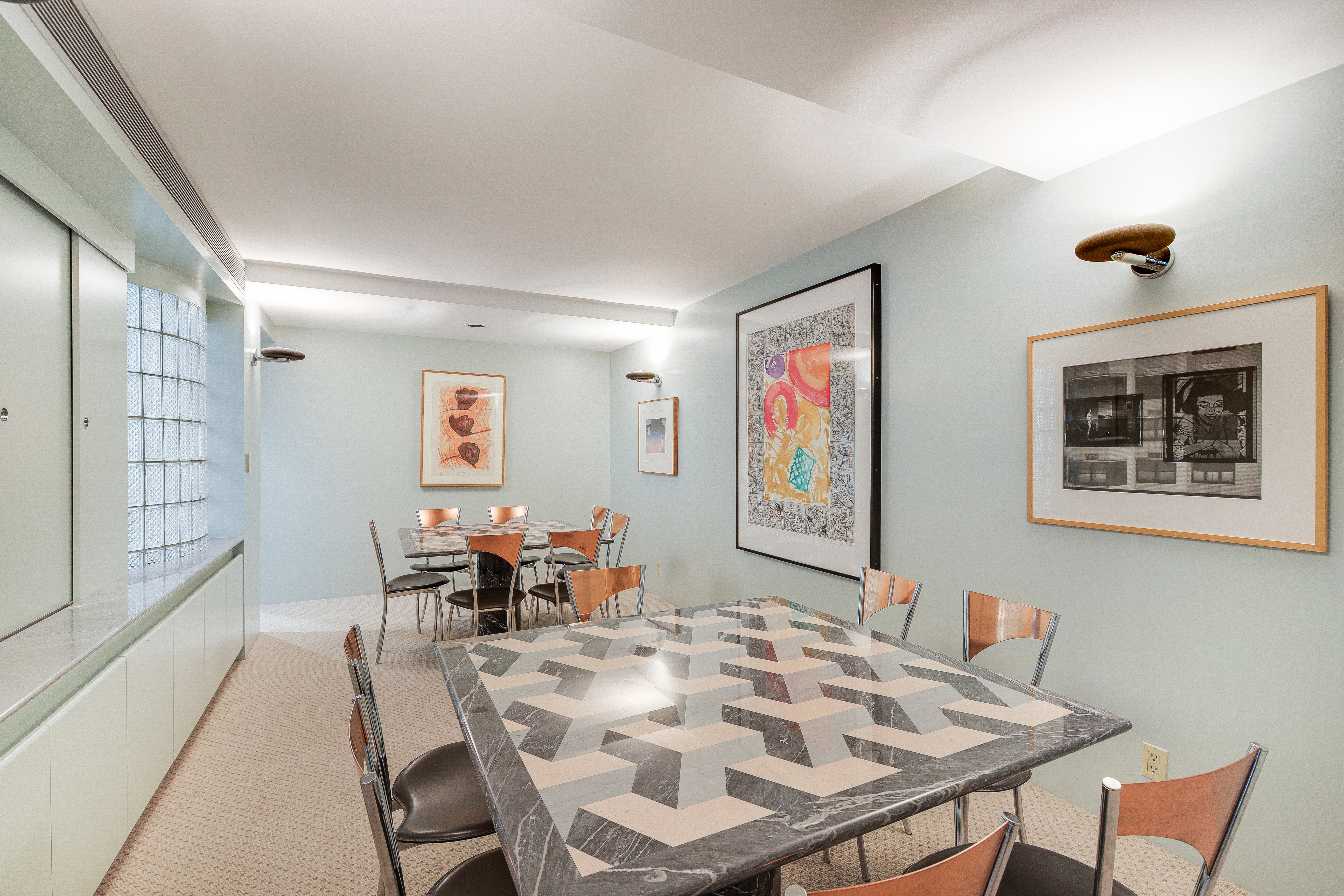 1175 Park Avenue, Unit 13B Manhattan, NY 10128 - Photo 6 of 12 a view of a dining room with furniture window and outside view