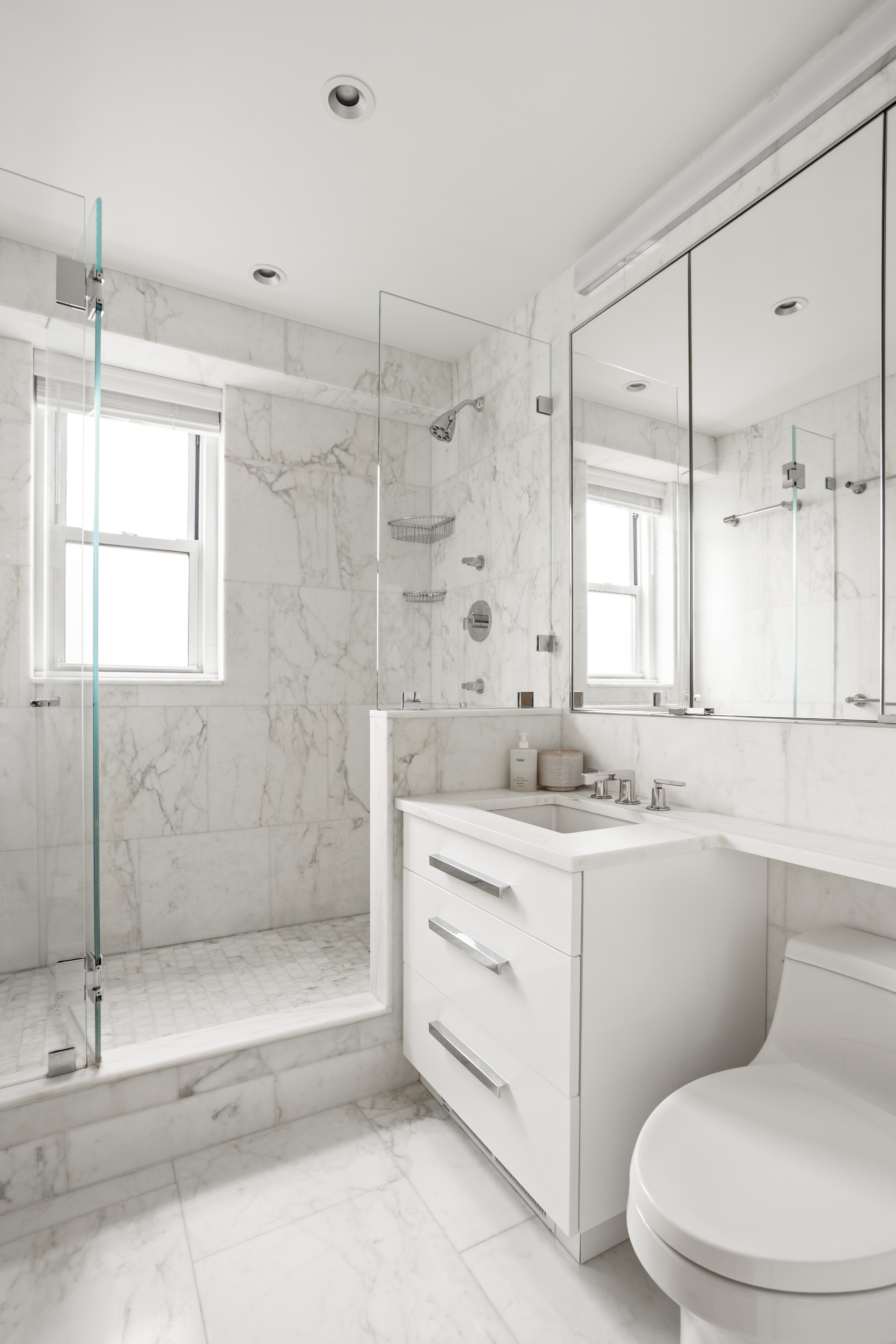 60 East End Avenue, Unit 12C Manhattan, NY 10028 - Photo 10 of 27 a bathroom with a sink a toilet and shower