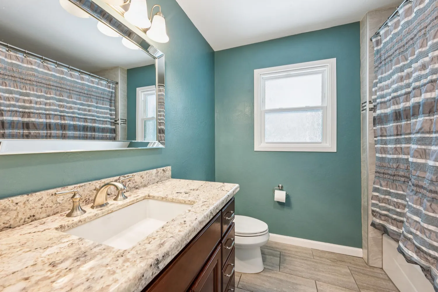 a view of backyard with green space