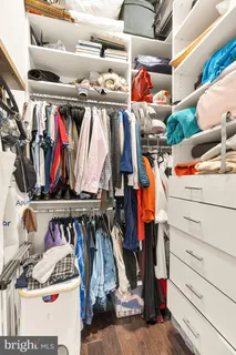 a view of a hallway with washer and dryer