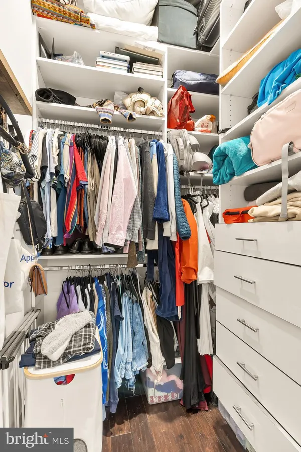 a view of a hallway with washer and dryer