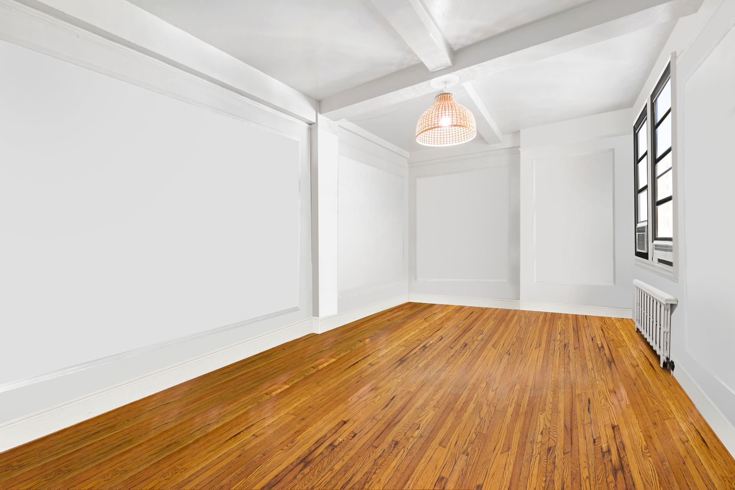 457 West 57th Street, Unit 1501 Manhattan, NY 10019 - Photo 3 of 6 a view of empty room with wooden floor and fan