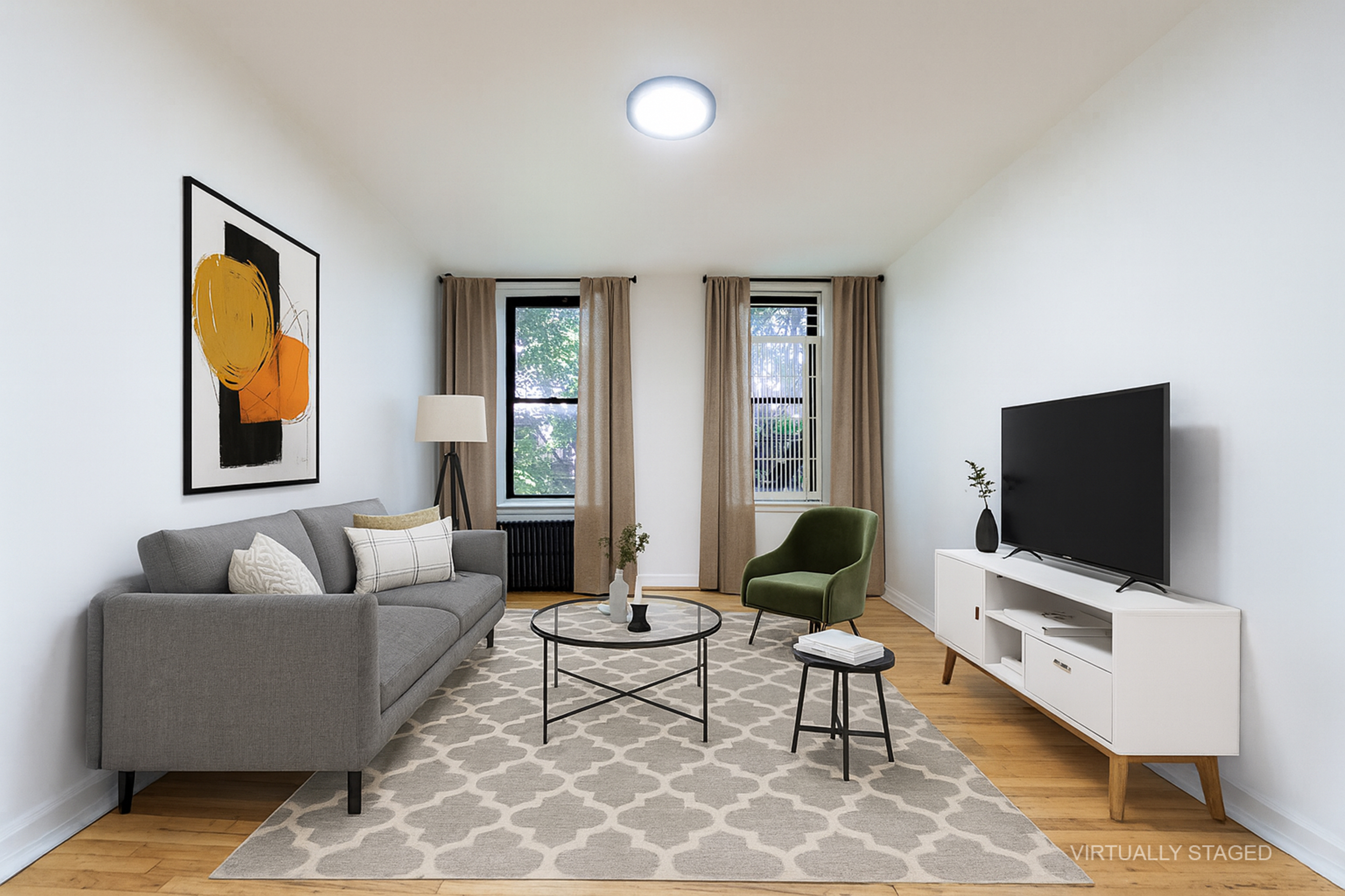 319 East 5th Street, Unit 13 Manhattan, NY 10003 - Photo 1 of 13 a living room with furniture and a flat screen tv