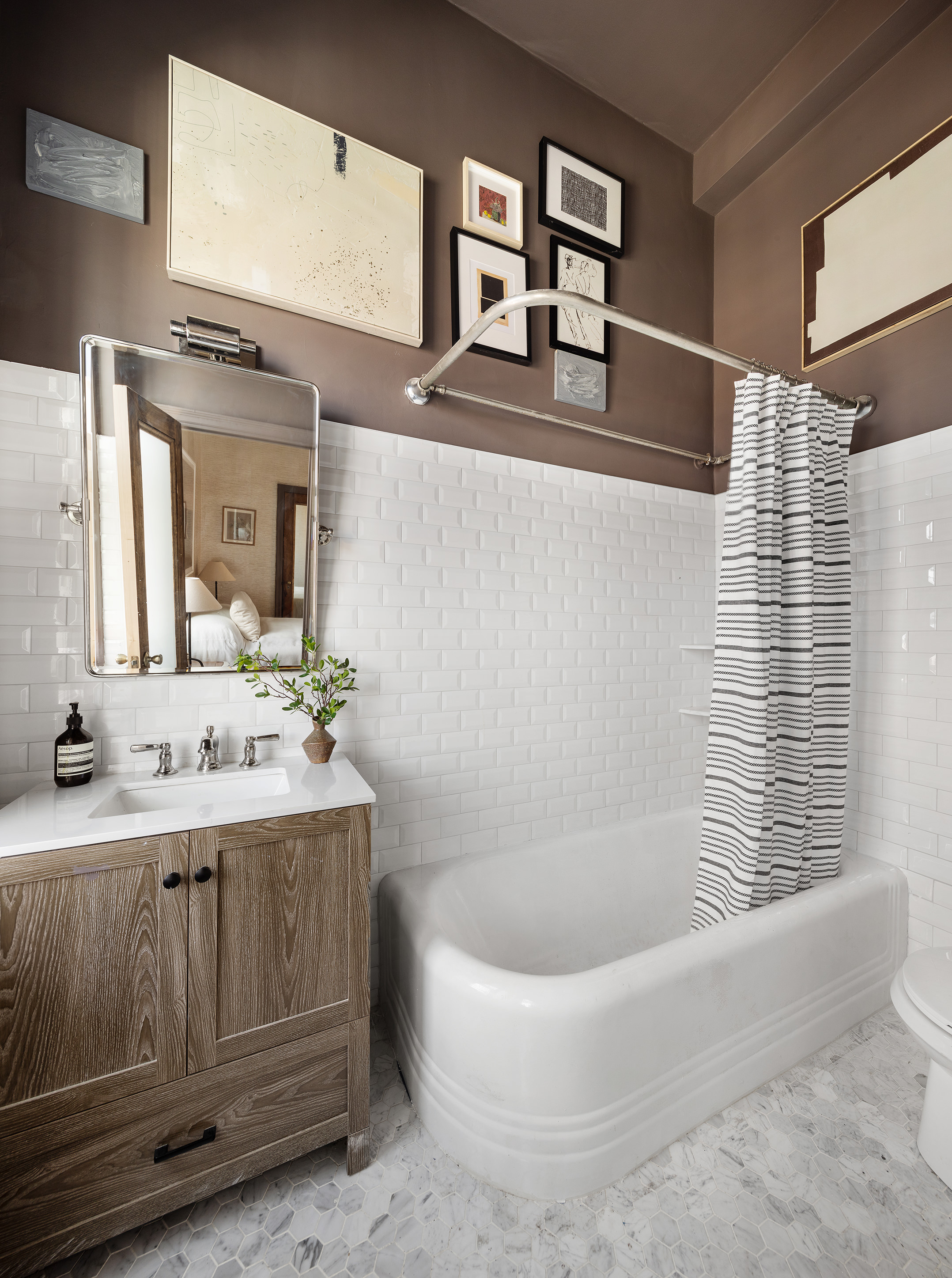 302 West 12th Street, Unit PHE Manhattan, NY 10014 - Photo 13 of 16 a bathroom with a bathtub and a sink