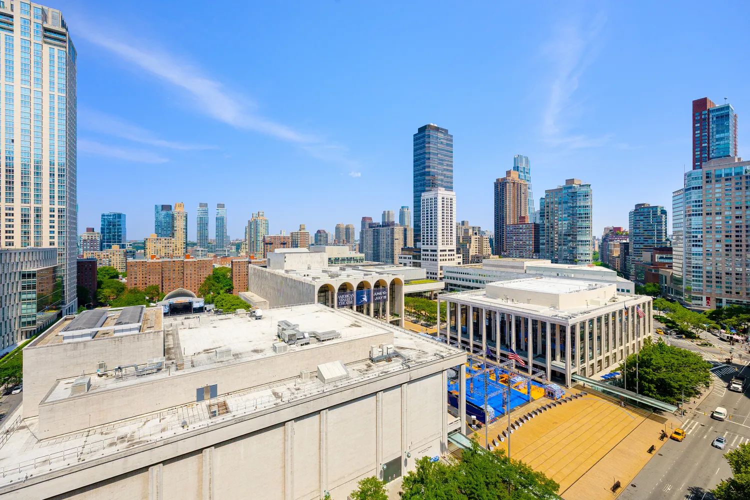 a view of a city with tall buildings