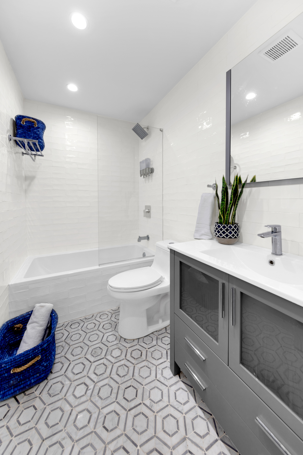 1118 Decatur Street Brooklyn, NY 11207 - Photo 15 of 18 a bathroom with a sink toilet and shower