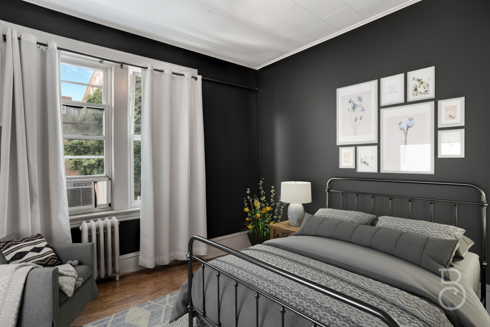 37-09 20th Road Queens, NY 11105 - Photo 11 of 16 a living room with furniture and a window