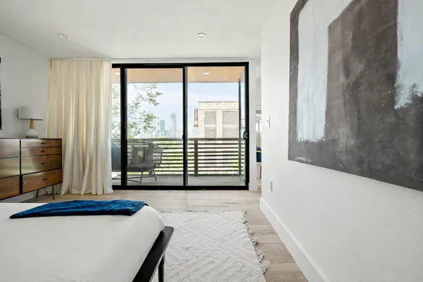 a view of a room with a large window