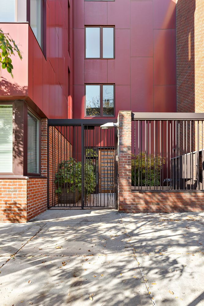 a view of a brick building with a street