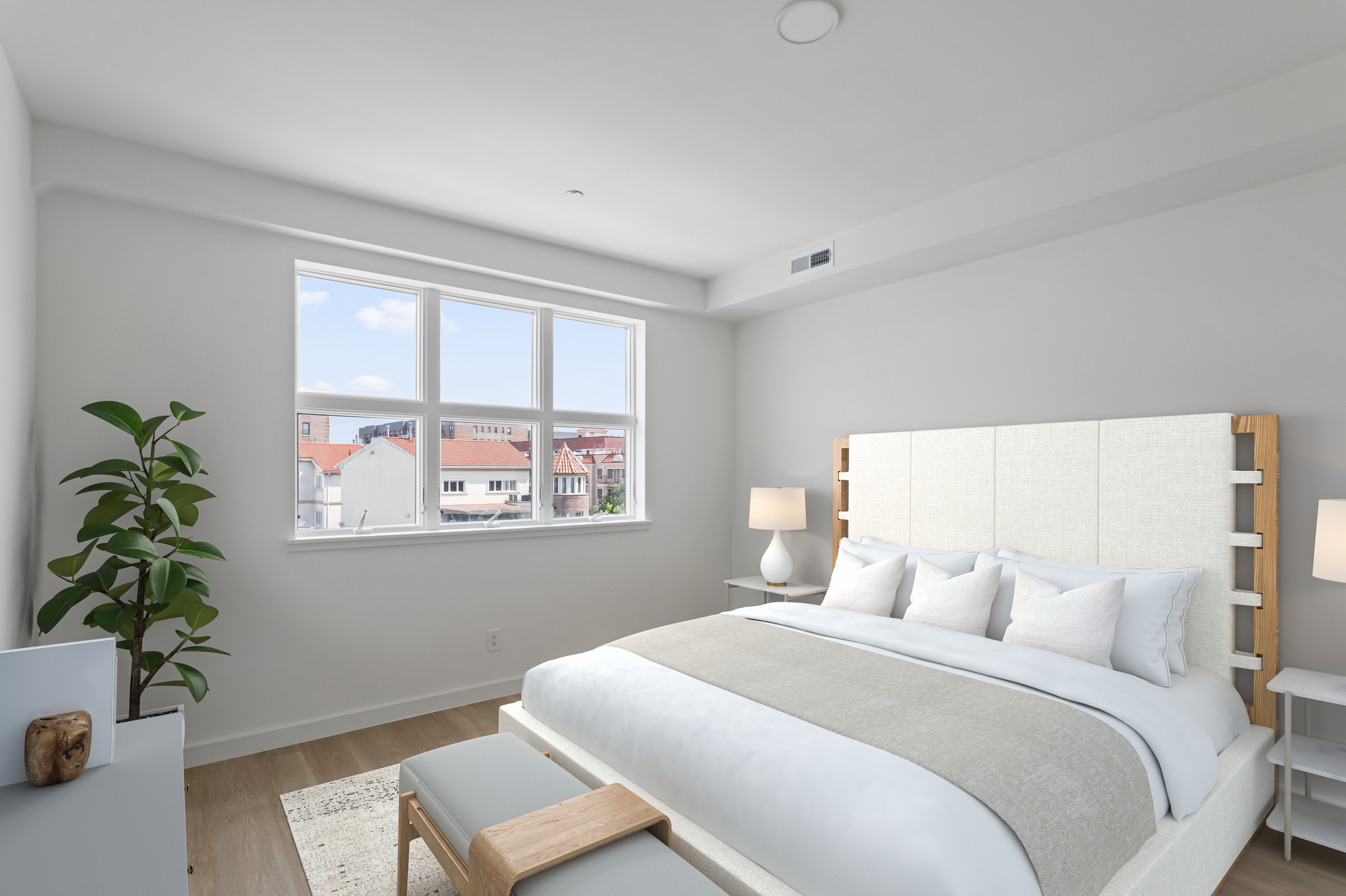 3112 Emmons Avenue, Unit 205 Brooklyn, NY 11235 - Photo 4 of 9 a bedroom with bed and a window