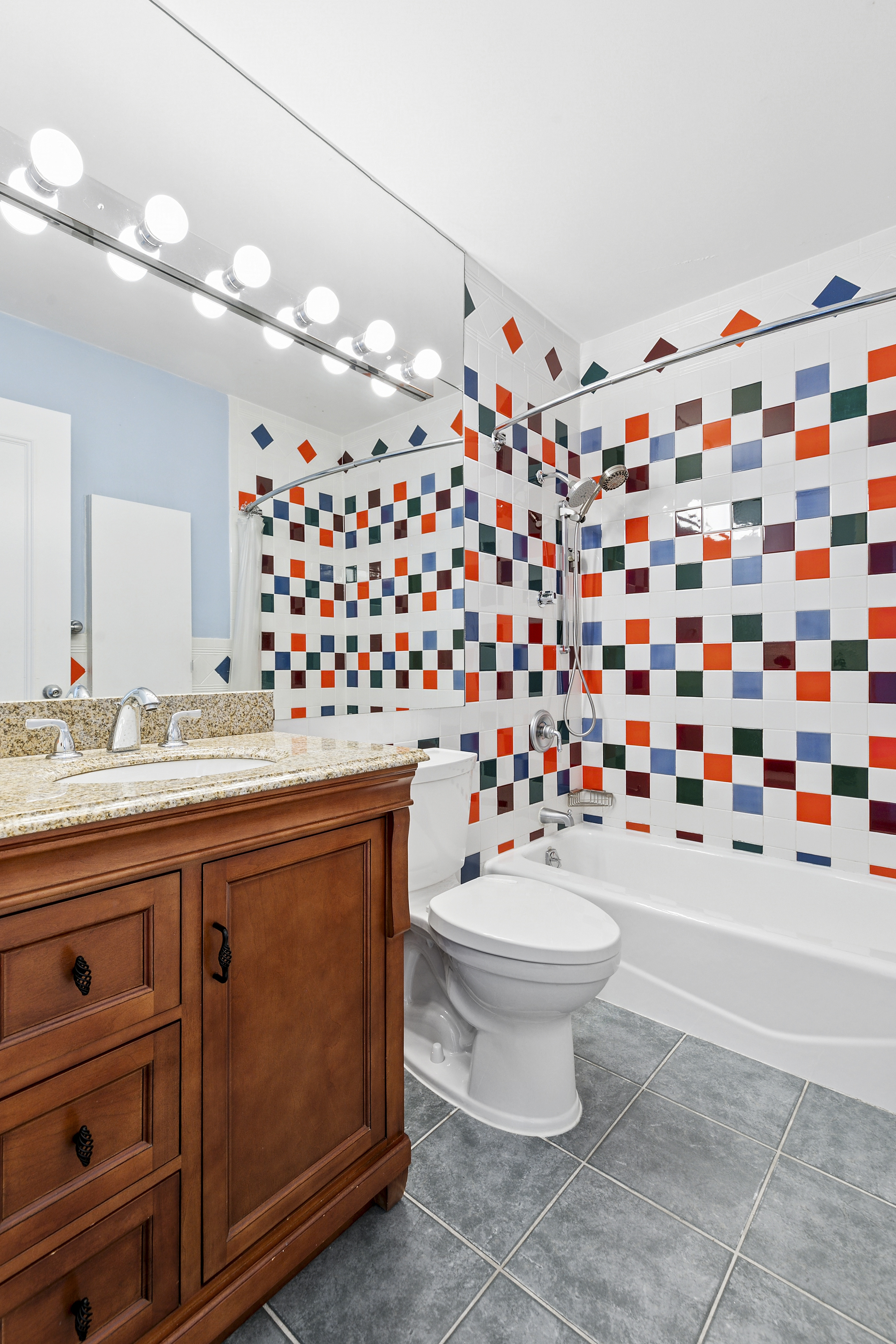 200 East 89th Street, Unit 34CD Manhattan, NY 10128 - Photo 15 of 20 a bathroom with a sink toilet and shower