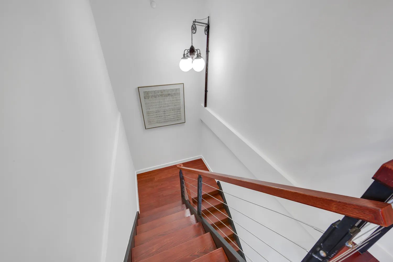 a view of hallway with stairs