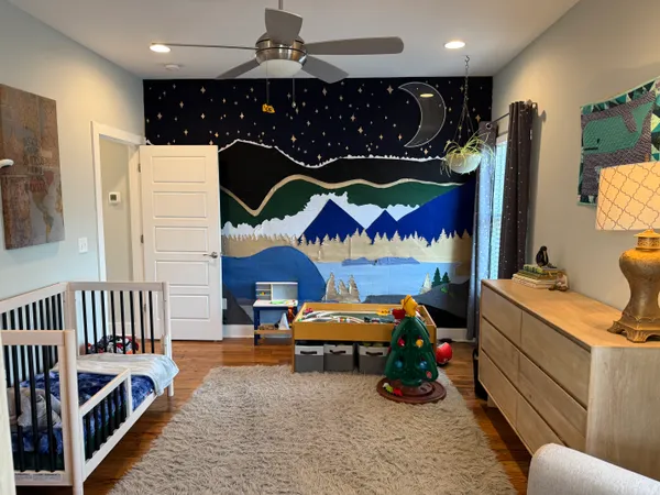 a room with furniture and a chandelier