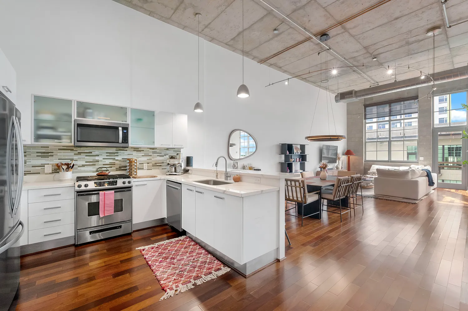a white bench sitting in front of a house