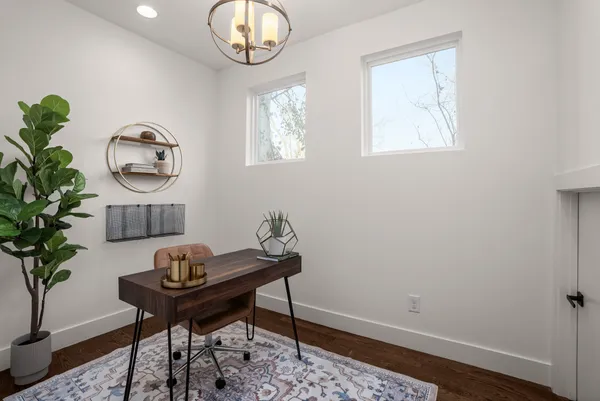 a view of a livingroom with furniture