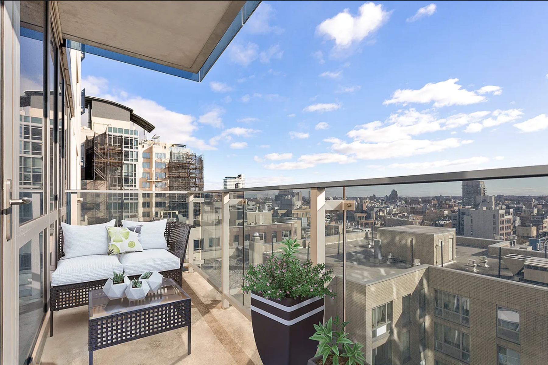 22 North 6th Street, Unit 12J Brooklyn, NY 11249 - Photo 7 of 13 a view of a balcony with couches