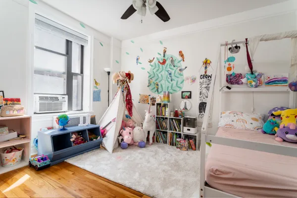 a room with toys and white walls