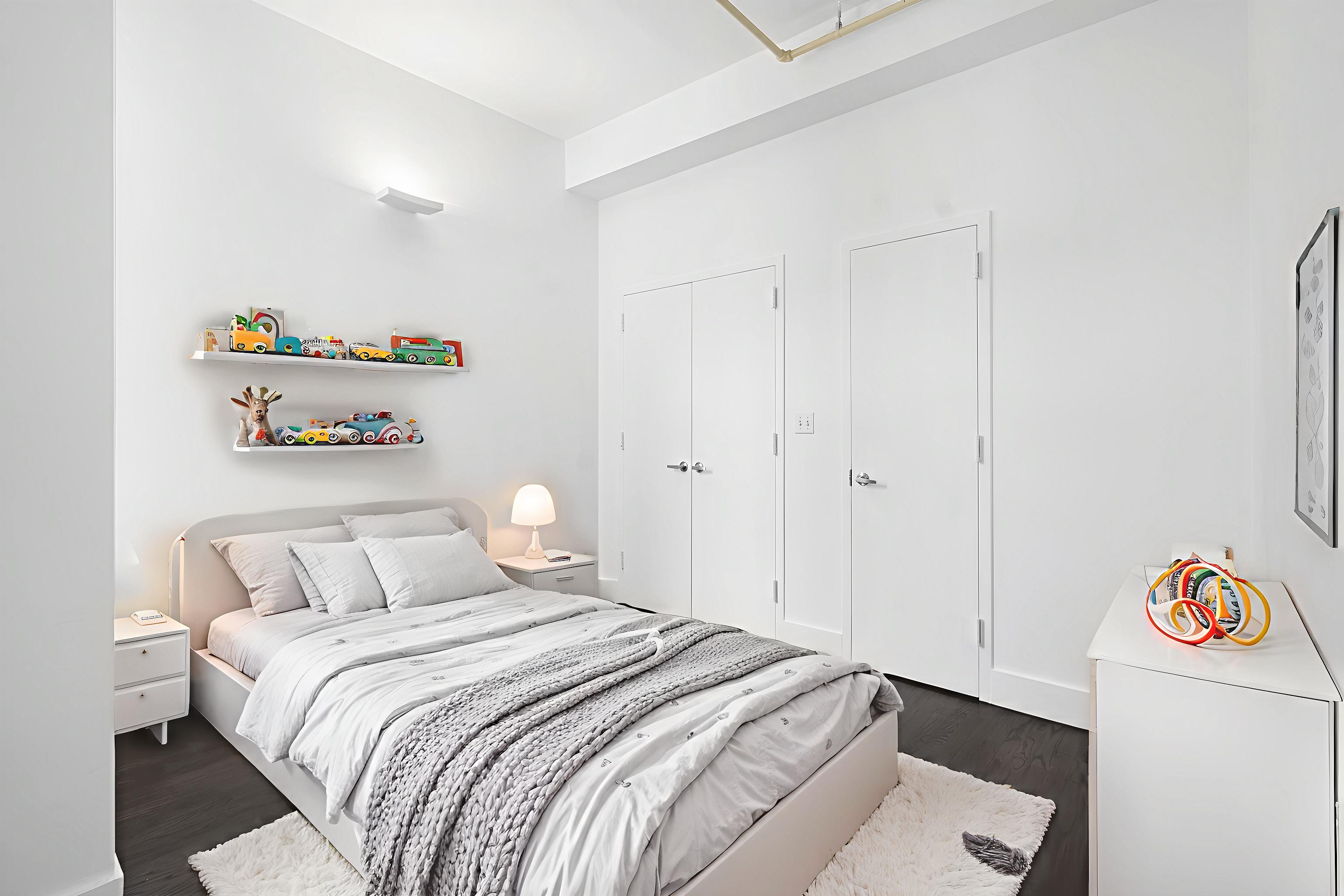 91 Grand Avenue, Unit 2D Brooklyn, NY 11205 - Photo 10 of 16 a bedroom with a bed and a window