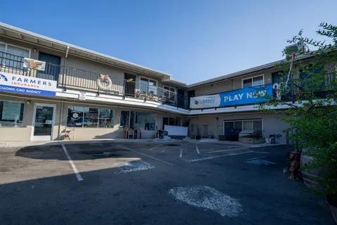 a view of a chairs and a fireplace in the room