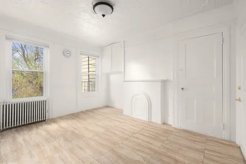 a view of a livingroom with a staircase