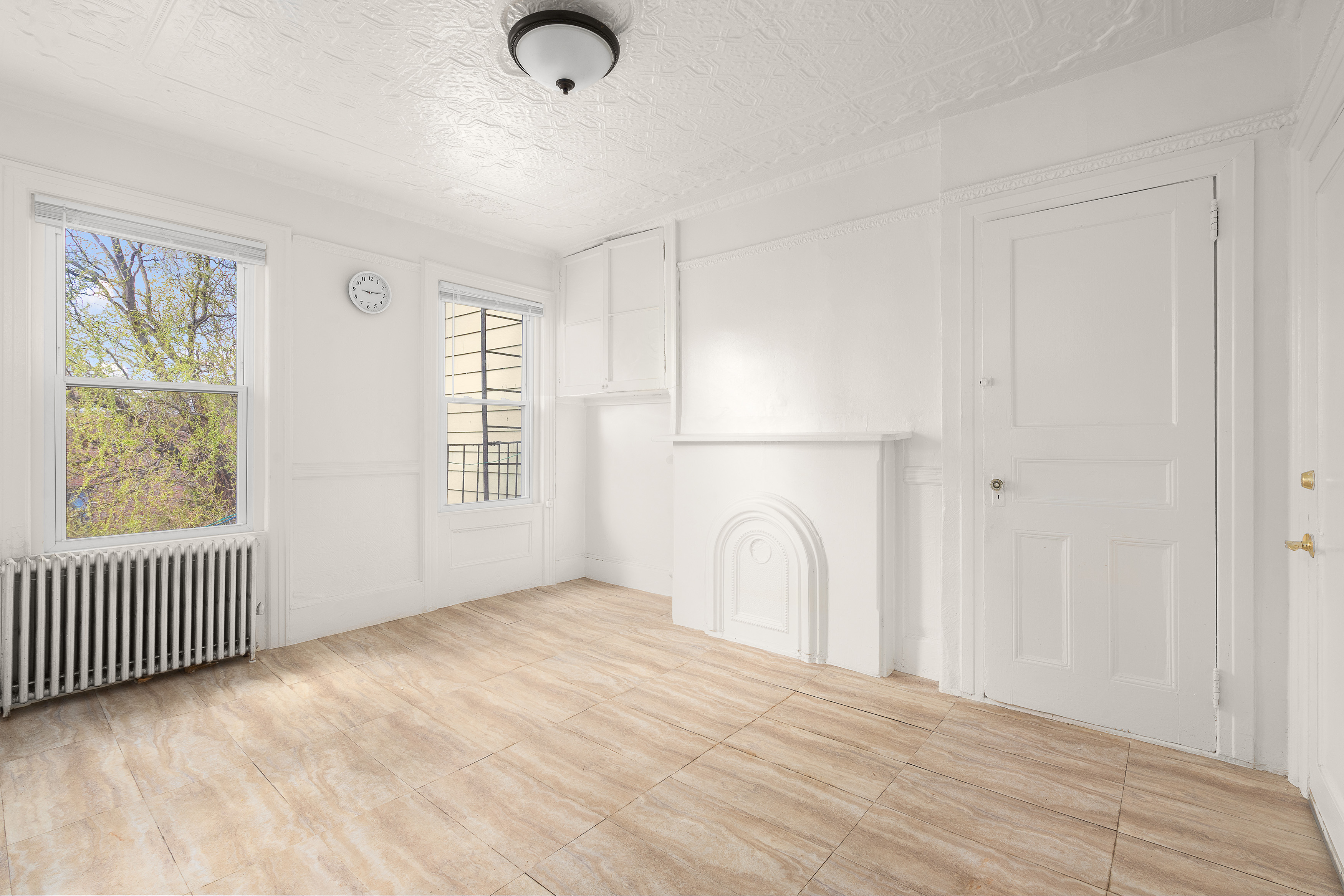 147 Eckford Street Brooklyn, NY 11222 - Photo 4 of 9 a view of a livingroom with a staircase
