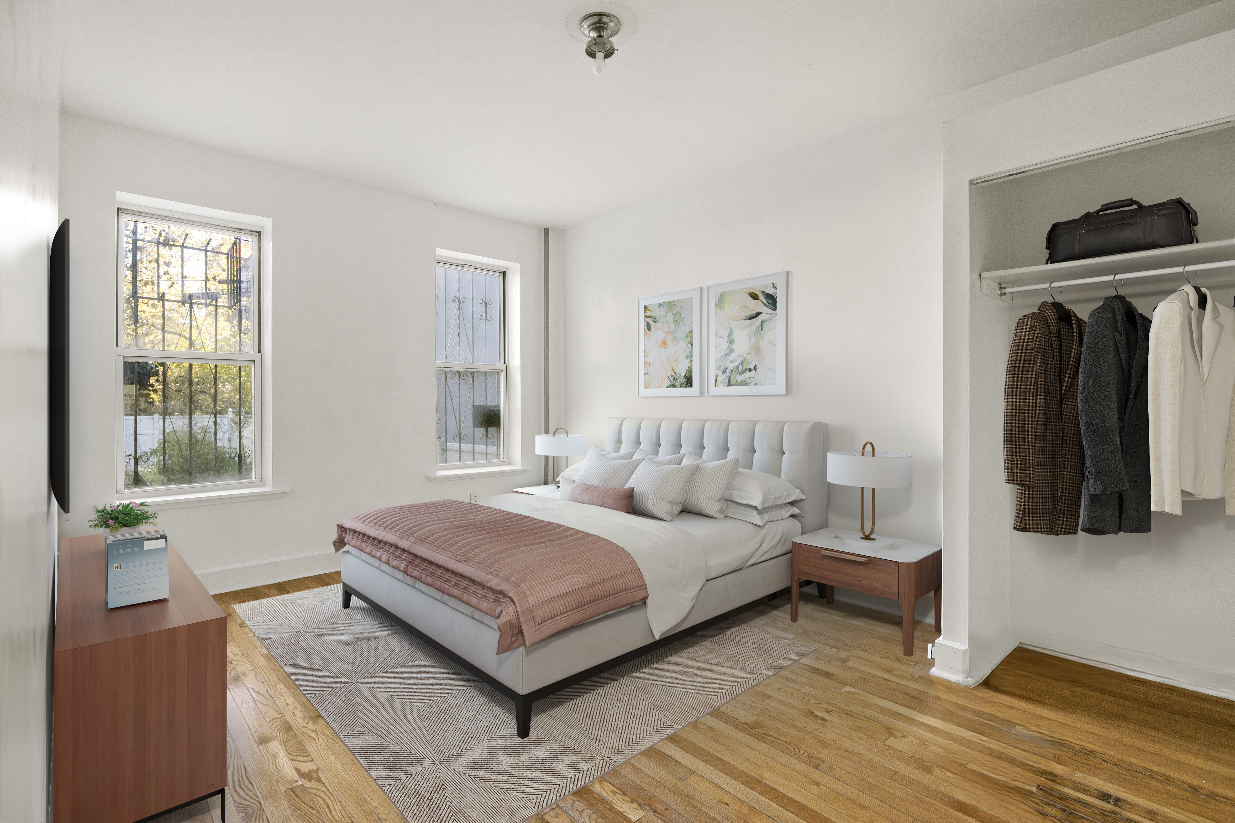 1437 Lincoln Place Brooklyn, NY 11213 - Photo 2 of 12 a bedroom with a bed and a couch