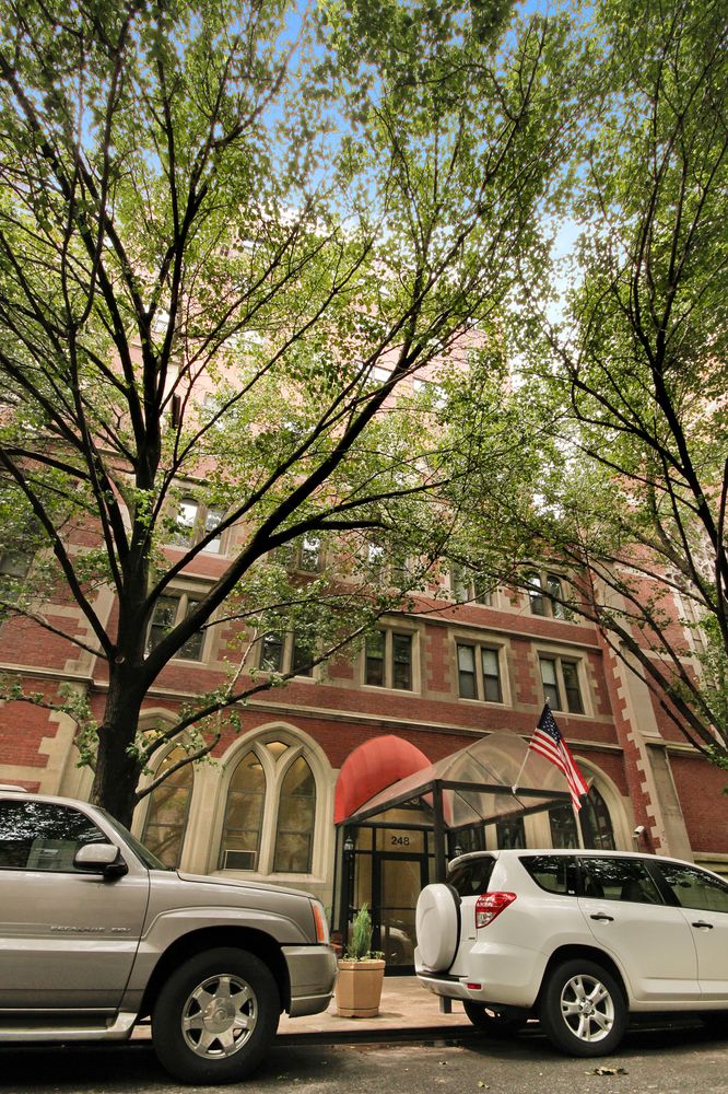 248 East 31st Street, Unit 4A Manhattan, NY 10016 - Photo 12 of 14 a front view of a house with parking space